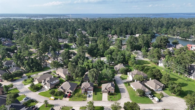 2818 Lake Forest Dr, Montgomery, TX 77356 - aerial view of property and surrounding area with nearby suburban area and a large body of water