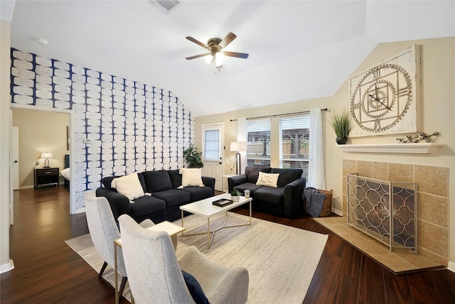 2818 Lake Forest Dr, Montgomery, TX 77356 - living area featuring ceiling fan, lofted ceiling, dark wood-style floors, and a fireplace