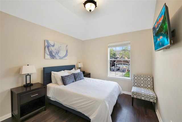 2818 Lake Forest Dr, Montgomery, TX 77356 - bedroom featuring dark wood-style flooring and baseboards