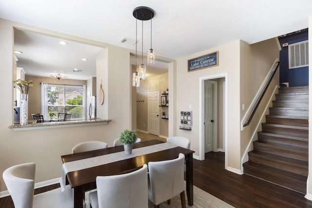 2818 Lake Forest Dr, Montgomery, TX 77356 - dining area featuring dark wood-style flooring, stairs, and recessed lighting