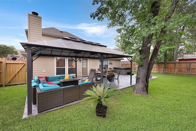2818 Lake Forest Dr, Montgomery, TX 77356 - rear view of house featuring a gazebo, outdoor lounge area, a chimney, a patio, and a fenced backyard