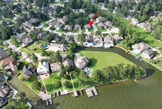 2818 Lake Forest Dr, Montgomery, TX 77356 - aerial view of property and surrounding area with nearby suburban area and a large body of water
