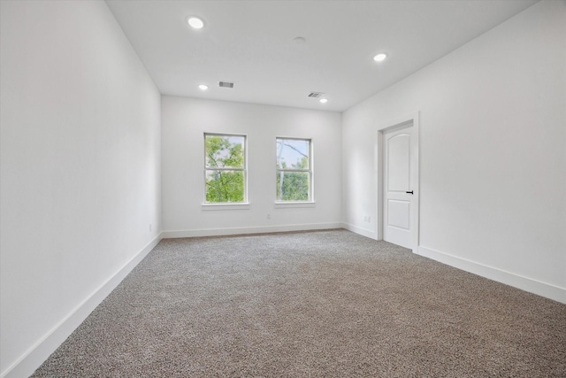 2015 Brackenridge St Unit B, Houston, TX 77026 - carpeted spare room with recessed lighting and baseboards