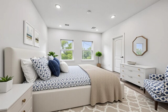 2015 Brackenridge St Unit C, Houston, TX 77026 - bedroom featuring wood finished floors and recessed lighting