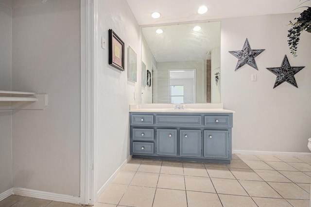 2128 Wimbleton Ct, Pearland, TX 77581 - bathroom featuring vanity, tile patterned floors, and recessed lighting