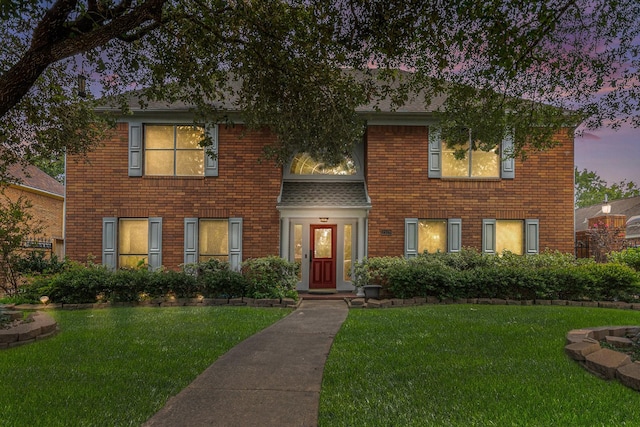 2128 Wimbleton Ct, Pearland, TX 77581 - view of front of home featuring brick siding and a yard