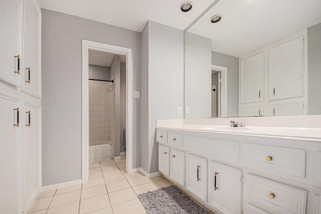 2128 Wimbleton Ct, Pearland, TX 77581 - bathroom featuring vanity, tile patterned flooring, and  shower combination
