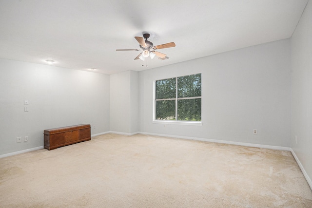 2128 Wimbleton Ct, Pearland, TX 77581 - carpeted empty room featuring a ceiling fan and baseboards