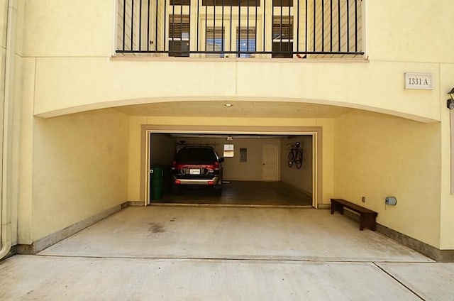 1331 W 21st St Unit A, Houston, TX 77008 - garage featuring baseboards