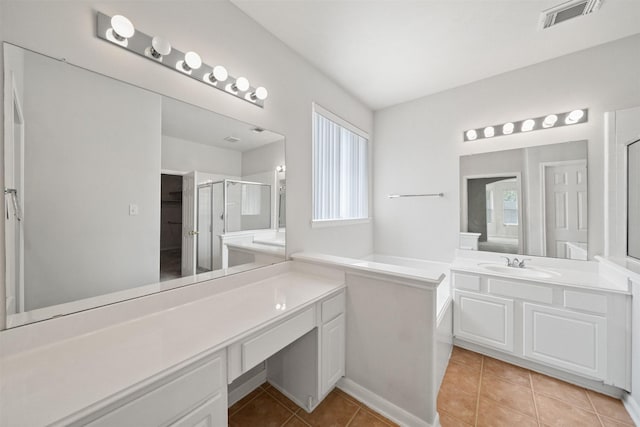 2022 Grand Willow Ln, Richmond, TX 77469 - full bathroom with tile patterned floors, a shower stall, and vanity