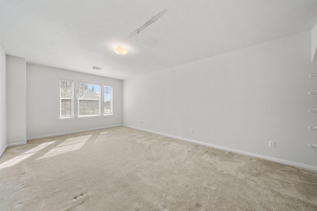2022 Grand Willow Ln, Richmond, TX 77469 - unfurnished room with light carpet and baseboards