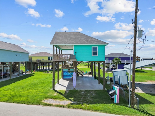 1790 Catfish Ln, Crystal Beach, TX 77650 - view of jungle gym featuring a yard and stairs