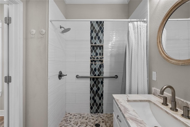 1790 Catfish Ln, Crystal Beach, TX 77650 - full bathroom with tiled shower, vanity, and crown molding
