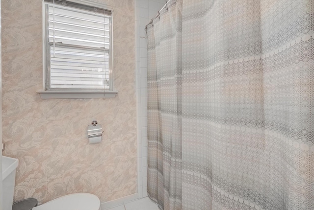 1120 Redfish St, Bayou Vista, TX 77563 - bathroom featuring toilet and a shower with shower curtain