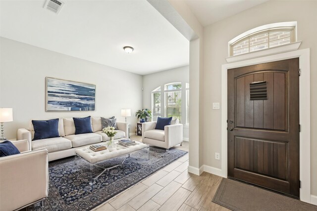 18314 Pedernales Springs Dr, Cypress, TX 77433 - foyer entrance with baseboards and wood finished floors