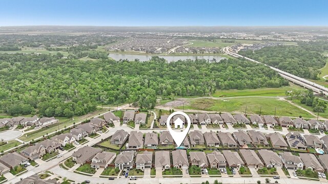 18314 Pedernales Springs Dr, Cypress, TX 77433 - aerial overview of property's location with a nearby body of water and nearby suburban area