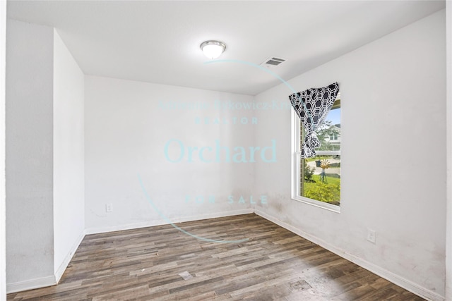 15689 Del Norte Dr, Conroe, TX 77306 - empty room with wood finished floors and baseboards