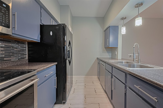 4001 Tanglewilde St Unit 1402, Houston, TX 77063 - kitchen featuring light marble finish floors, appliances with stainless steel finishes, backsplash, hanging light fixtures, and gray cabinetry