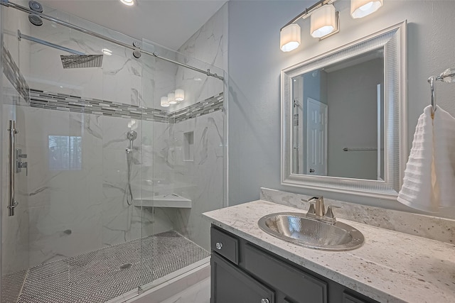 4001 Tanglewilde St Unit 1402, Houston, TX 77063 - full bathroom with a marble finish shower and vanity