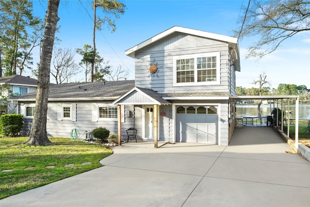 13318 Southshore Dr, Conroe, TX 77304 - traditional-style home featuring driveway, a garage, a shingled roof, and a front yard