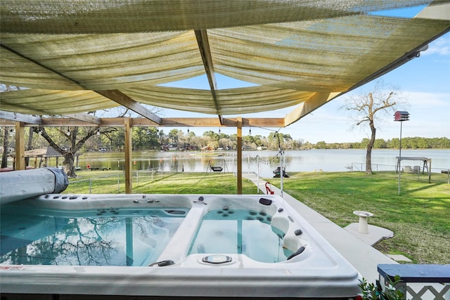 13318 Southshore Dr, Conroe, TX 77304 - view of patio with a water view and a hot tub