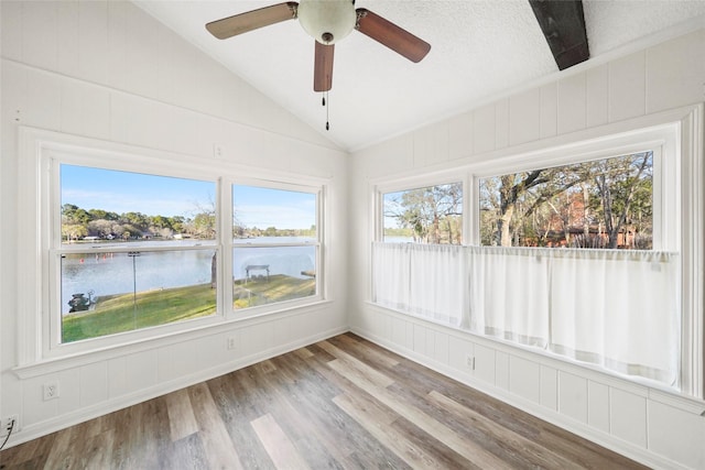 13318 Southshore Dr, Conroe, TX 77304 - unfurnished sunroom featuring vaulted ceiling and a water view