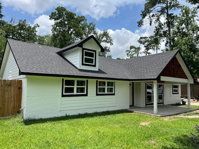 25907 Maplewood Dr, Spring, TX 77386 - back of house featuring brick siding and a shingled roof