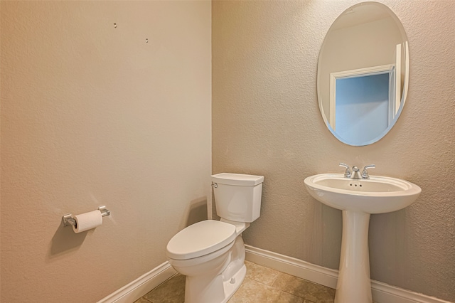 10022 Foggy Riv, Missouri City, TX 77459 - half bathroom with toilet and tile patterned floors