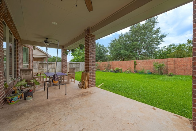 10022 Foggy Riv, Missouri City, TX 77459 - fenced backyard with ceiling fan and a patio area