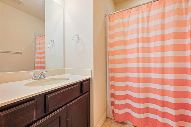 10022 Foggy Riv, Missouri City, TX 77459 - bathroom featuring vanity and curtained shower