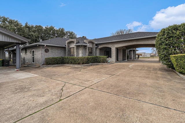 1454 Oday, Pearland, TX 77581 - french country home featuring brick siding, a chimney, and roof with shingles