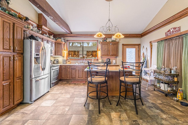 1454 Oday, Pearland, TX 77581 - kitchen with appliances with stainless steel finishes, brown cabinets, lofted ceiling, light countertops, and stone finish floors