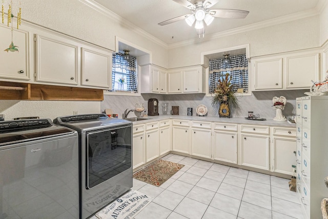 1454 Oday, Pearland, TX 77581 - washroom with separate washer and dryer, cabinet space, ceiling fan, crown molding, and light tile patterned flooring