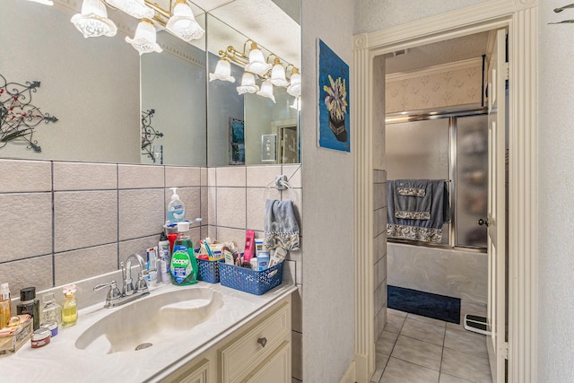 1454 Oday, Pearland, TX 77581 - bathroom with combined bath / shower with glass door, tile patterned flooring, and vanity