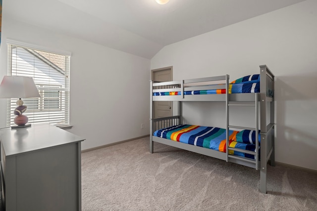 17907 Aqua Haven Ln, Conroe, TX 77302 - carpeted bedroom featuring vaulted ceiling and baseboards