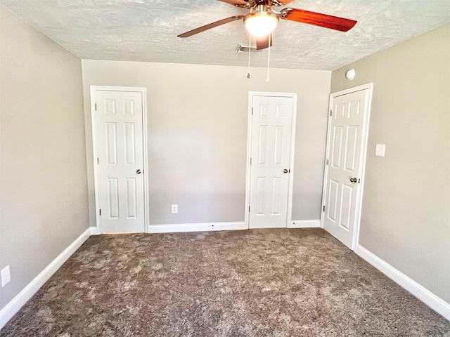 415 Sevenhampton Ln, Houston, TX 77015 - unfurnished bedroom featuring a textured ceiling, carpet floors, and ceiling fan