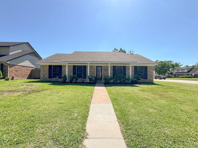 415 Sevenhampton Ln, Houston, TX 77015 - ranch-style house with a front yard and brick siding