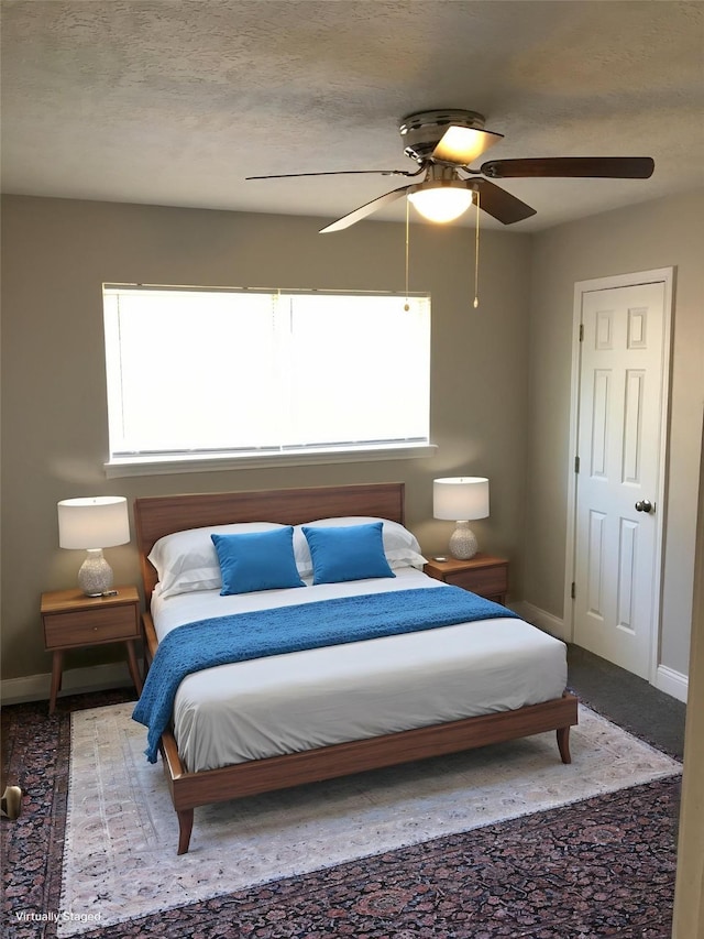 415 Sevenhampton Ln, Houston, TX 77015 - bedroom with ceiling fan and carpet floors