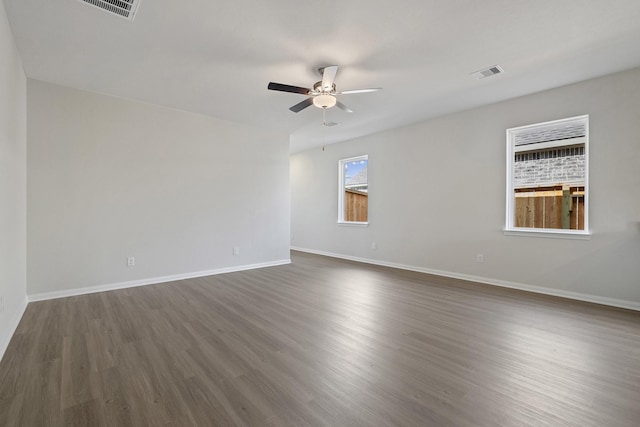 1031 Rosewood Trl, Beasley, TX 77417 - empty room featuring ceiling fan and dark wood-style floors