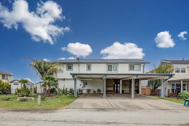253 Barracuda St, Bayou Vista, TX 77563 - view of property with concrete driveway and a front yard