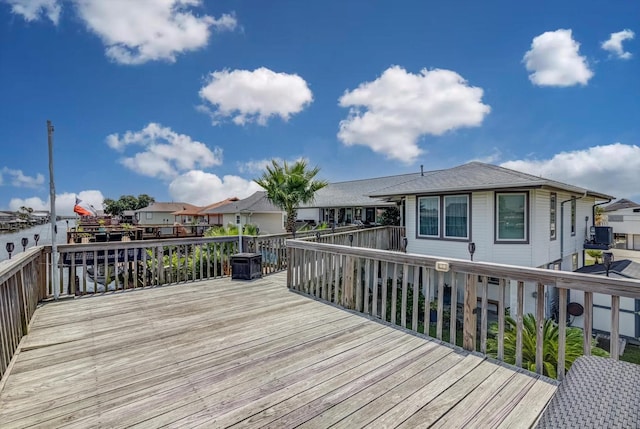 253 Barracuda St, Bayou Vista, TX 77563 - wooden deck with a residential view