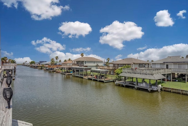 253 Barracuda St, Bayou Vista, TX 77563 - dock area with a water view, a residential view, and boat lift