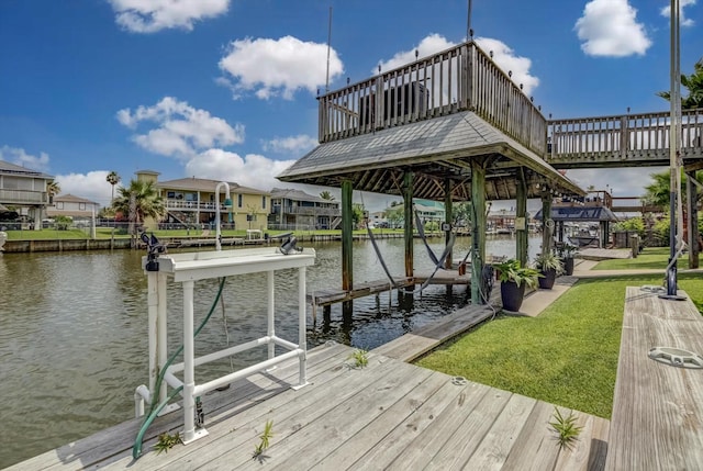 253 Barracuda St, Bayou Vista, TX 77563 - dock with a water view, boat lift, and a lawn