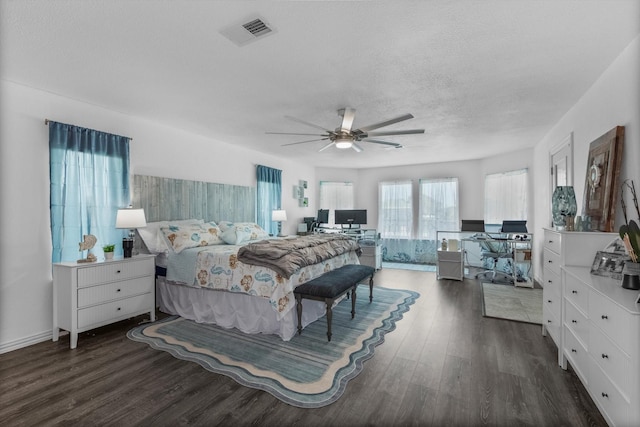253 Barracuda St, Bayou Vista, TX 77563 - bedroom with wood finished floors, an office area, a textured ceiling, and ceiling fan