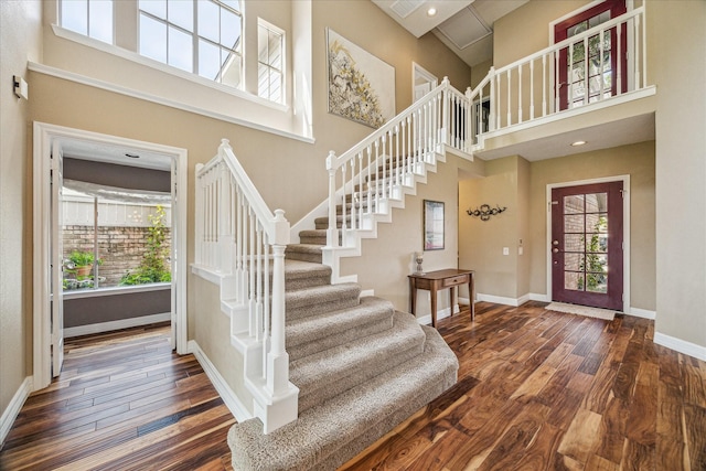 16063 Hidden Acres Dr, Houston, TX 77084 - foyer entrance featuring stairway, hardwood / wood-style floors, and a towering ceiling