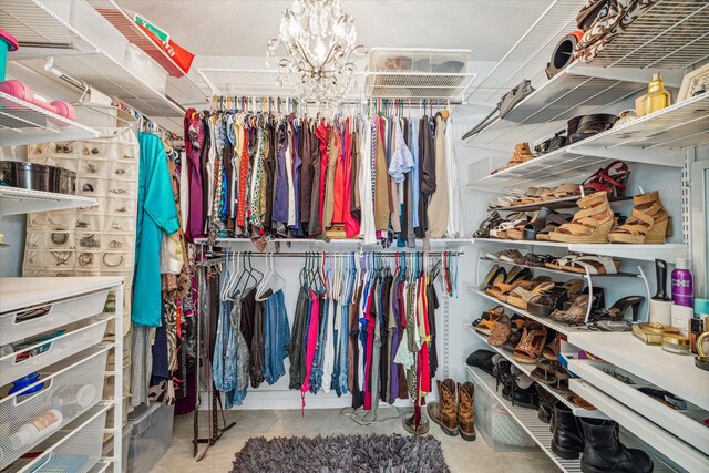 16063 Hidden Acres Dr, Houston, TX 77084 - spacious closet with a chandelier