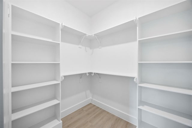 4601 Newberry St A/B, Unit A/B Houston, TX 77051 - spacious closet featuring wood finished floors