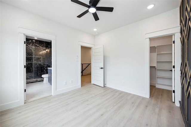 4601 Newberry St A/B, Unit A/B Houston, TX 77051 - unfurnished bedroom with a walk in closet, light wood-style flooring, recessed lighting, a closet, and ensuite bath