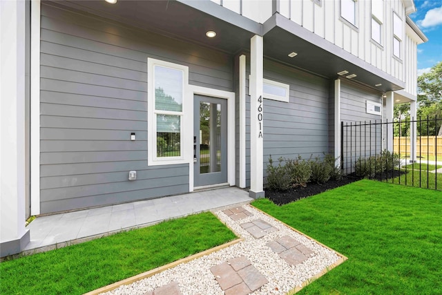 4601 Newberry St A/B, Unit A/B Houston, TX 77051 - doorway to property featuring board and batten siding