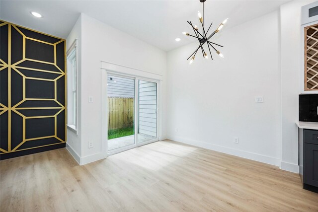 4601 Newberry St A/B, Unit A/B Houston, TX 77051 - unfurnished dining area featuring a chandelier, light wood finished floors, and recessed lighting